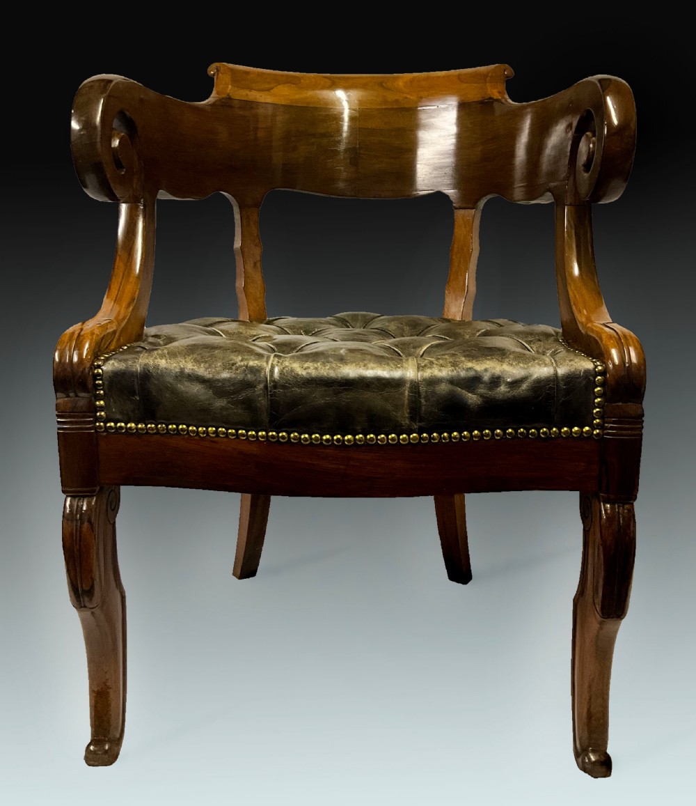 A French Empire desk chair. Circa 1820.