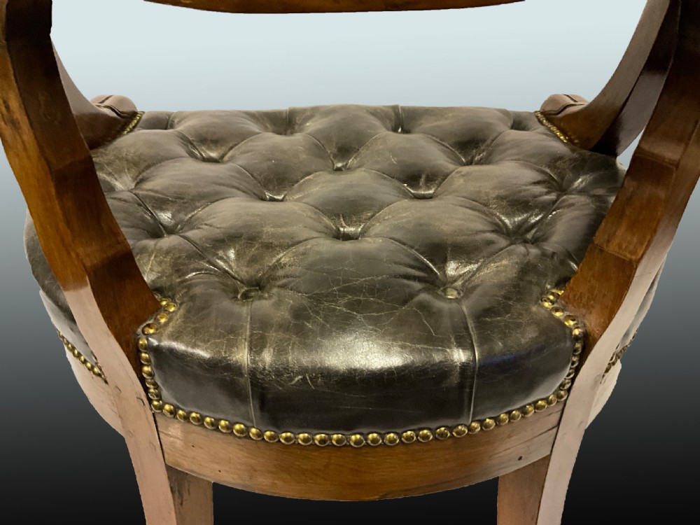 A French Empire desk chair. Circa 1820. View III