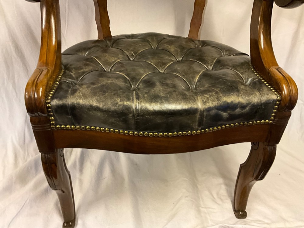 A French Empire desk chair. Circa 1820. View V