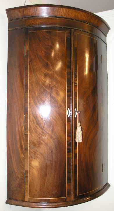 fig 1. FINE GEORGE III SMALL MAHOGANY BOW FRONT CORNER CABINET