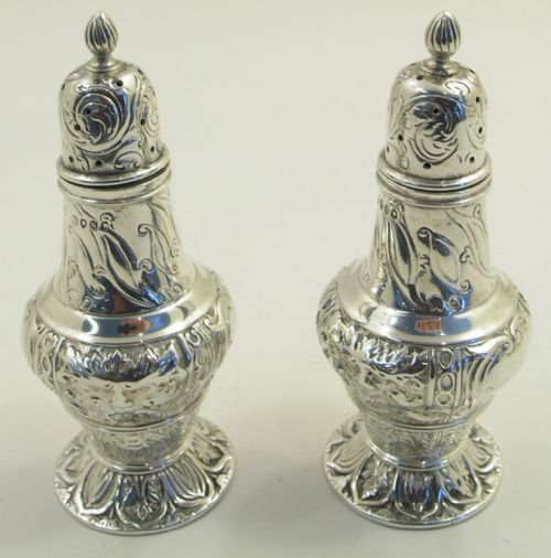 Ornate Pair of Victorian Silver Pepperettes. 1888