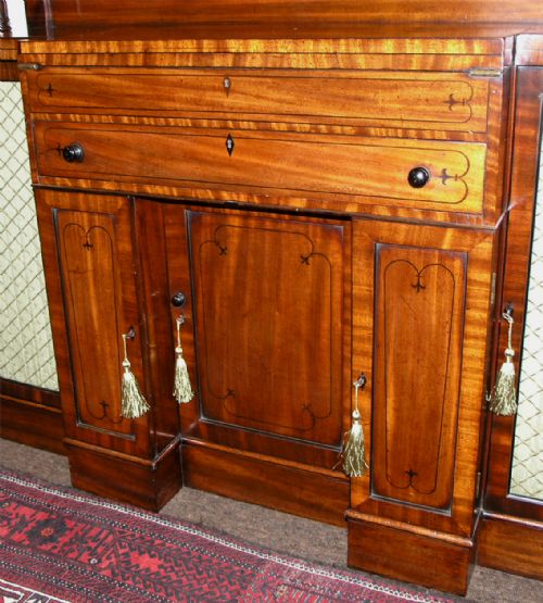 fig 1. OUTSTANDING REGENCY MAHOGANY BREAKFRONT CABINET. C. 1820