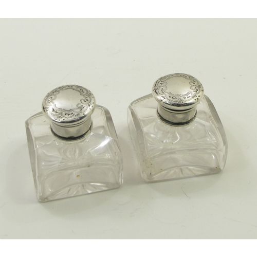 Pair of Silver Topped Cut Glass Scent Bottles