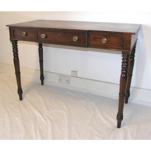 fig 1. GEORGE III MAHOGANY BREAKFRONT HALL TABLE