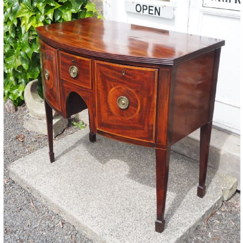 fig 1. FINE SMALL GEORGE III MAHOGANY BOW SIDEBOARD