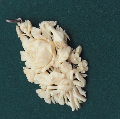 19th Century Carved Ivory Pendant
