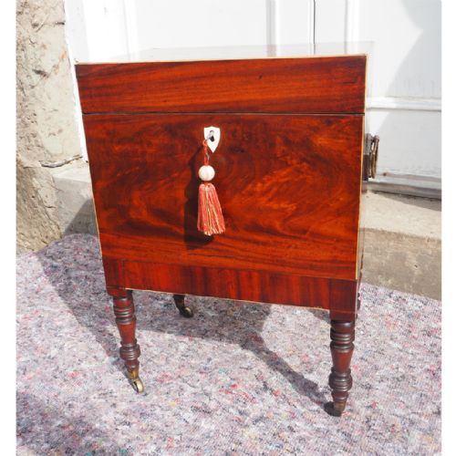 fig 2. GEORGIAN MAHOGANY CELLARETTE WITH DECANTERS