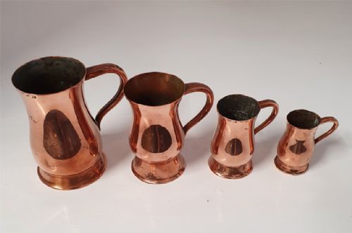 Set of 4 Small Graduated Copper Measures