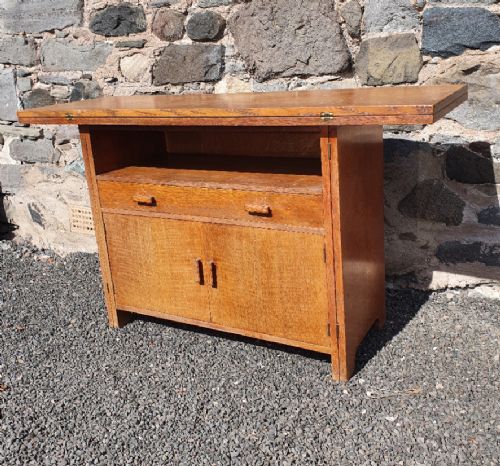 fig 1. Heal's London Oak Metamorphic Table Cabinet