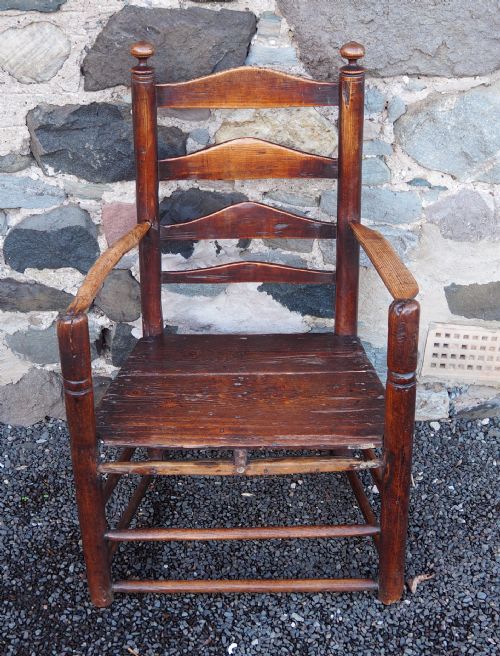 Unusual Early Ladder Back Arm Chair