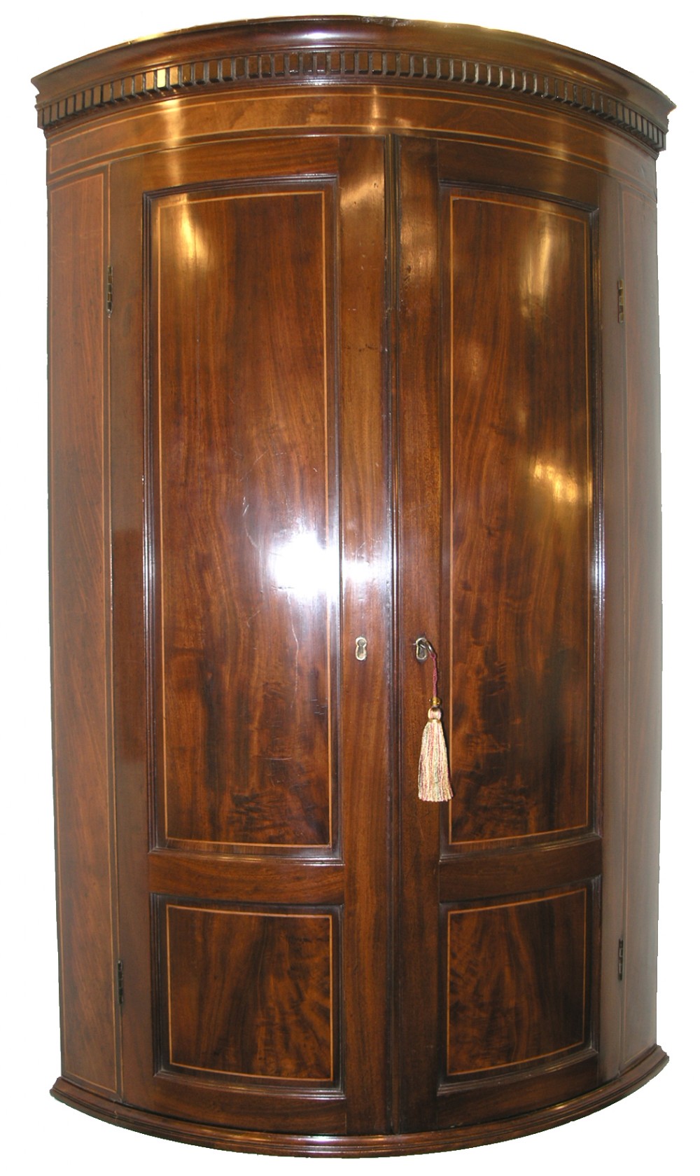 GEORGE III MAHOGANY BOW FRONT CORNER CABINET. C. 1790