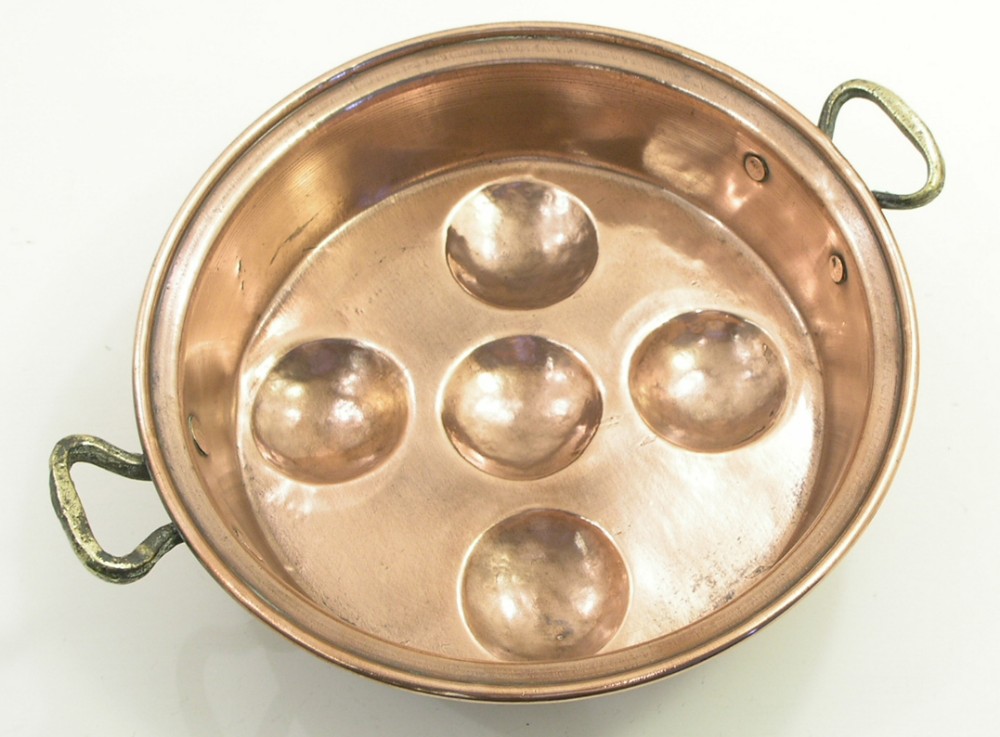 VICTORIAN COPPER AND BRASS EGG POACHER. C. 1880