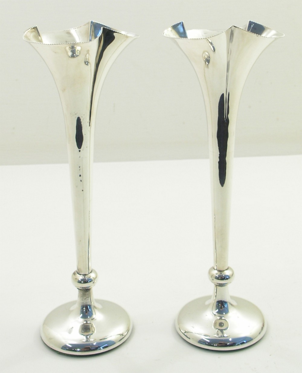 PRETTY PAIR OF SILVER FLOWER VASES. 1902