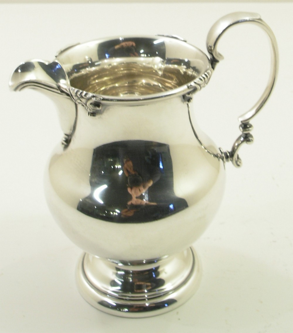 DELIGHTFUL SILVER CREAM JUG. BIRMINGHAM 1933