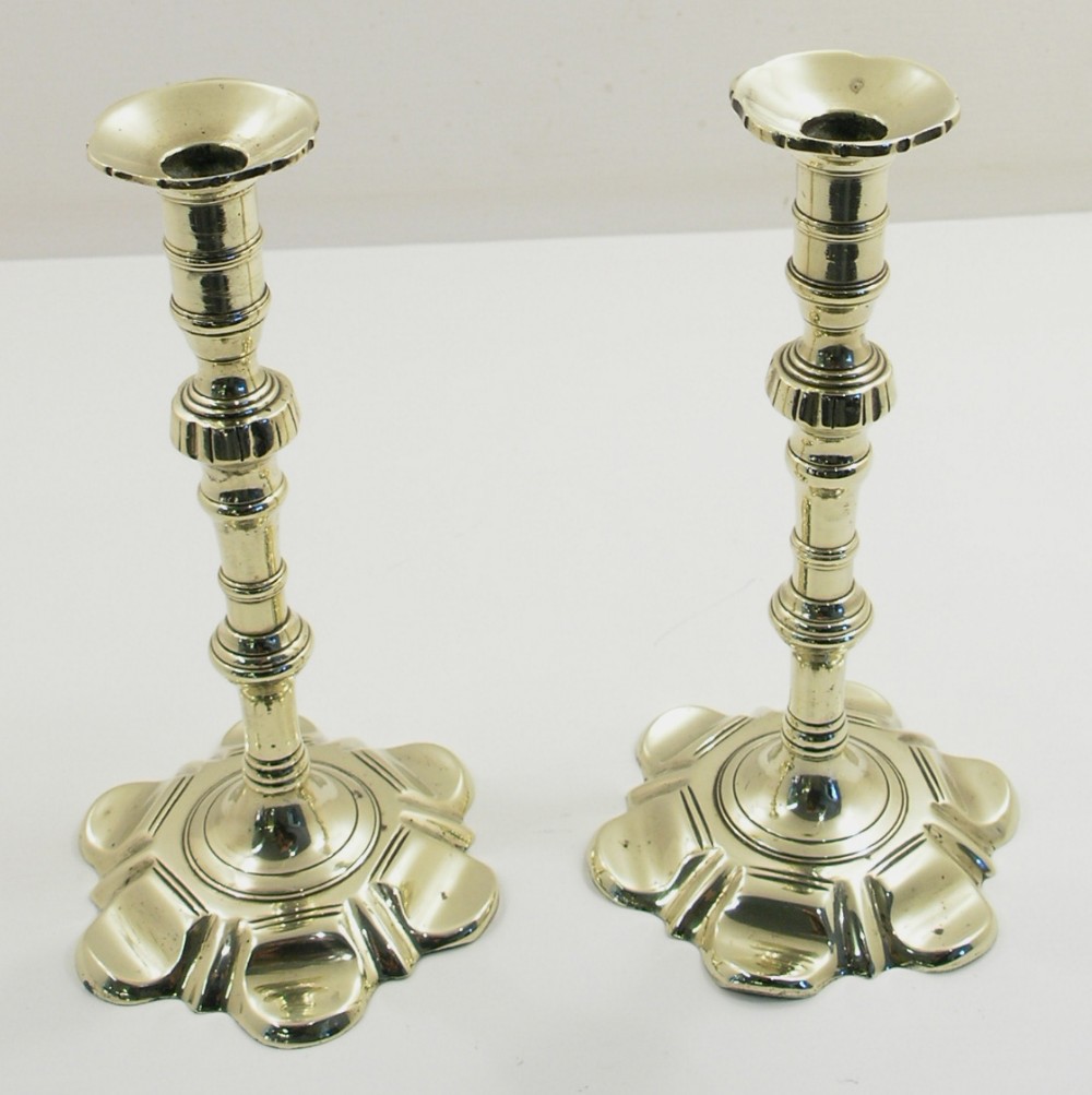 FINE PAIR GEORGIAN PETAL BASE CANDLESTICKS. C. 1800