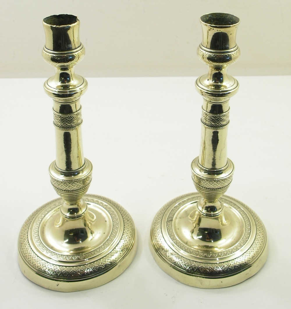 FINE PAIR OF EARLY FRENCH BRASS CANDLESTICKS. C. 1820