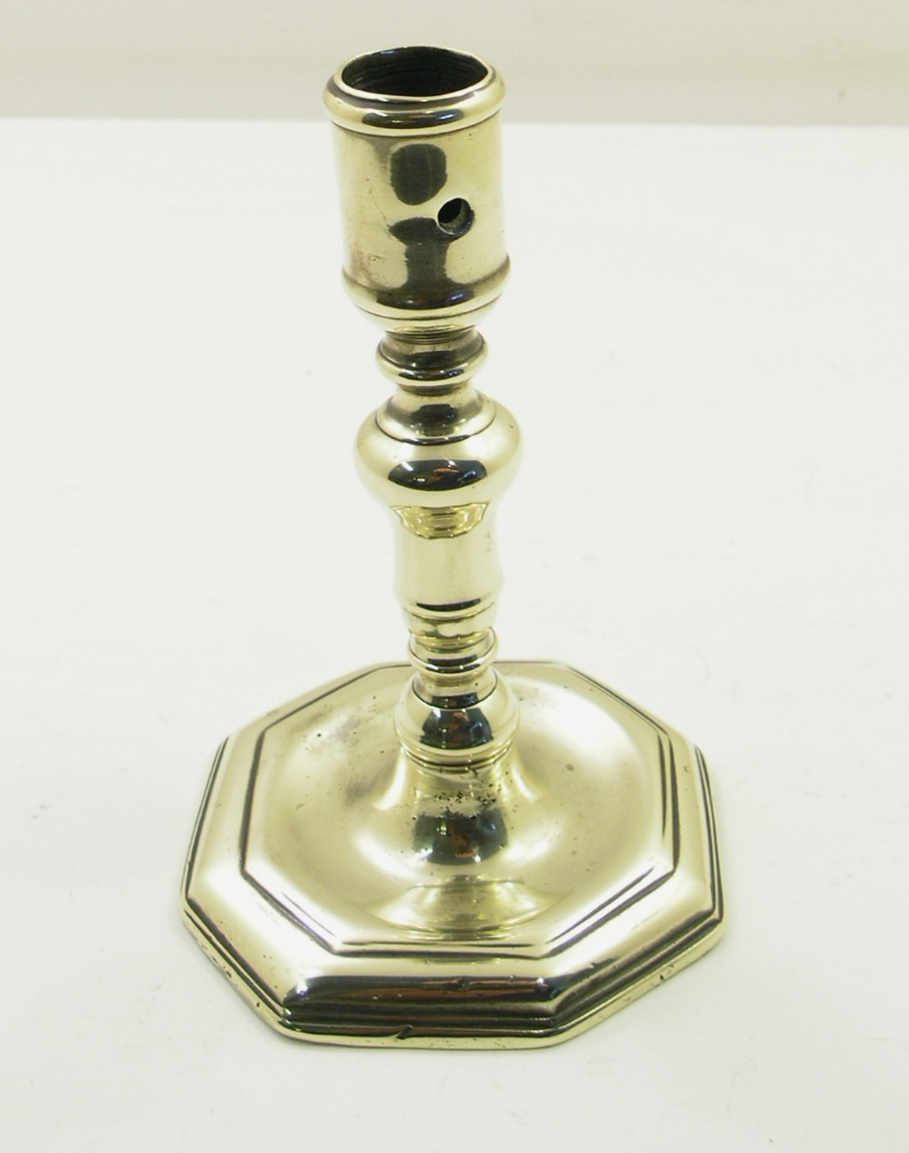 GOOD QUEEN ANNE PERIOD BRASS CANDLESTICK. C. 1710