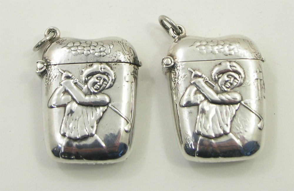 UNUSUAL PAIR OF SILVER LADIES GOLFING VESTA CASES