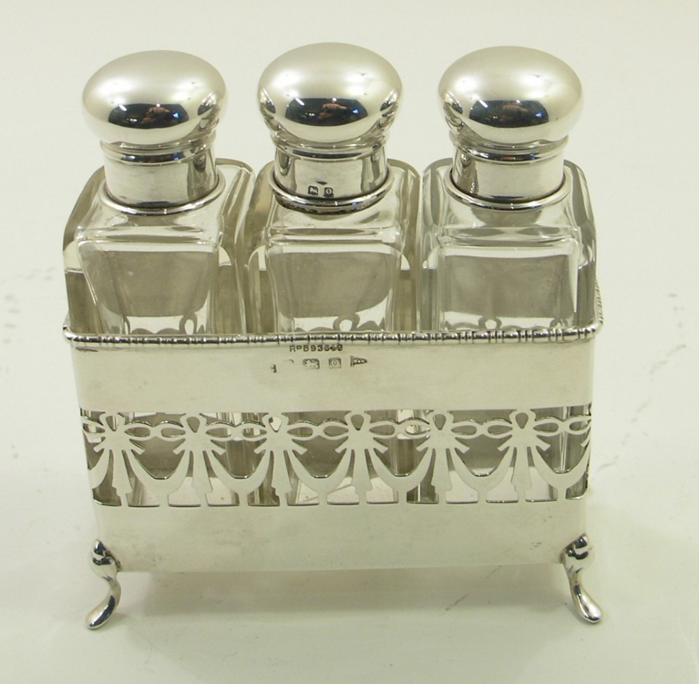 GOOD SILVER SCENT BOTTLES AND HOLDER. WALKER & HALL.