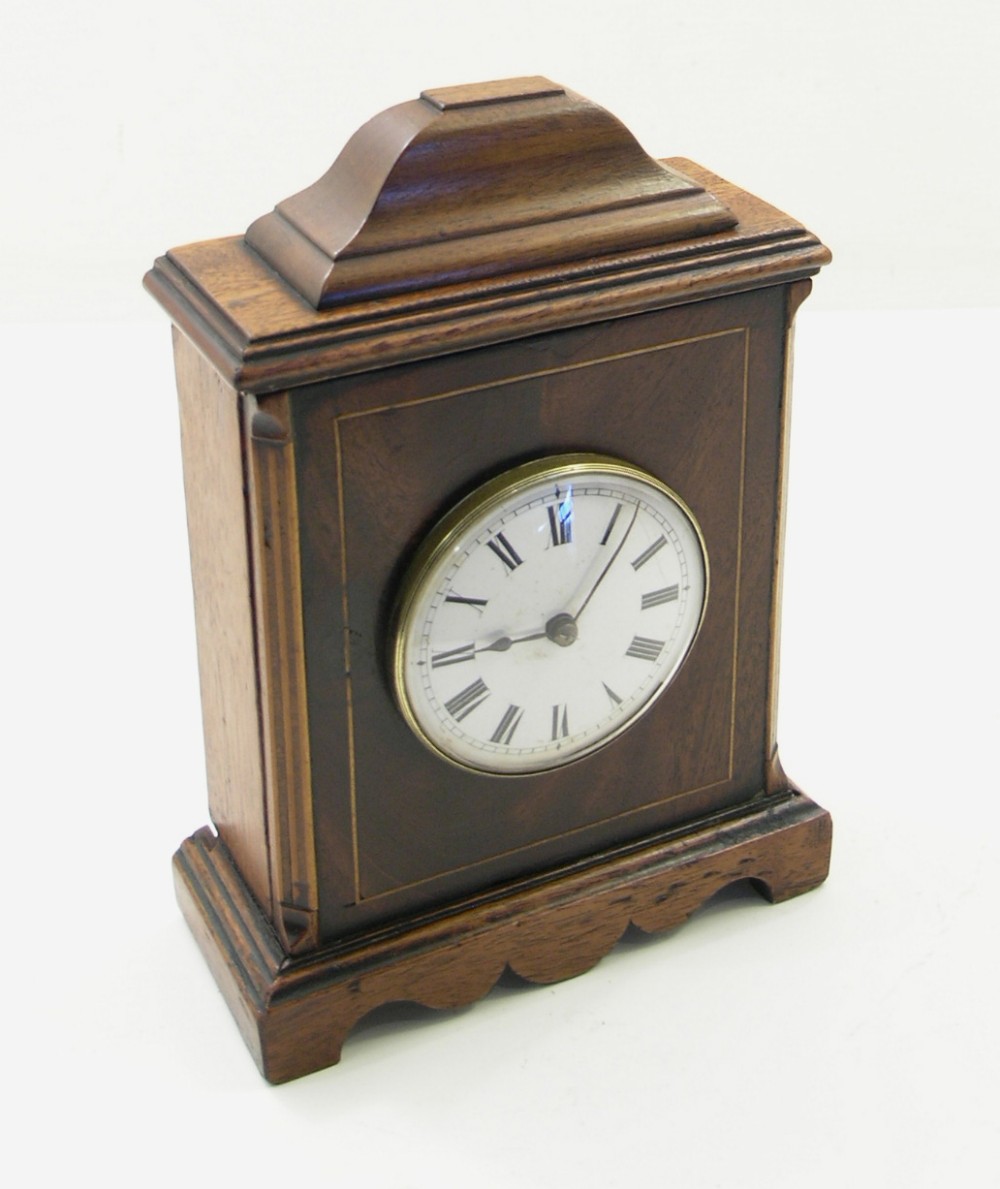 UNUSUAL GEORGIAN MAHOGANY MINIATURE BRACKET CLOCK
