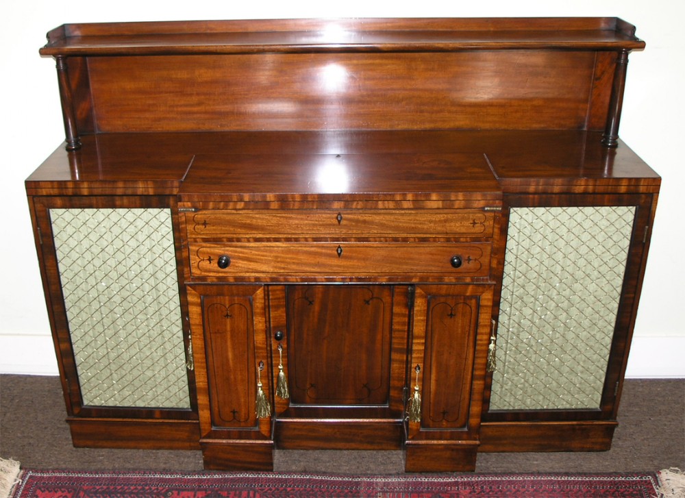 OUTSTANDING REGENCY MAHOGANY BREAKFRONT CABINET. C. 1820