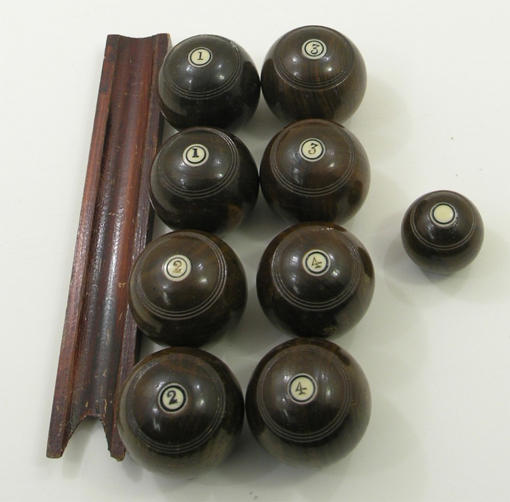 GOOD SET OF LIGNUM VITAE CARPET BOWLS. C. 1890