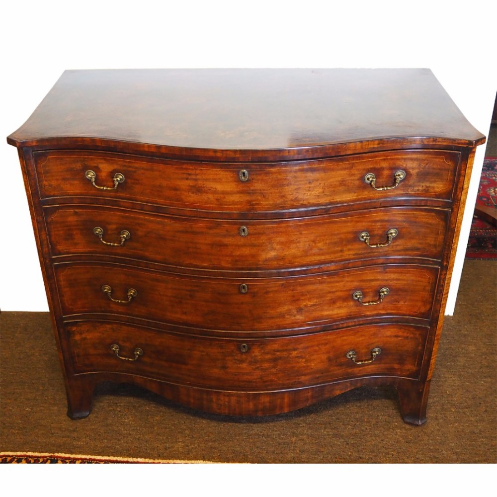 GEORGE III SCOTTISH MAHOGANY SERPENTINE CHEST