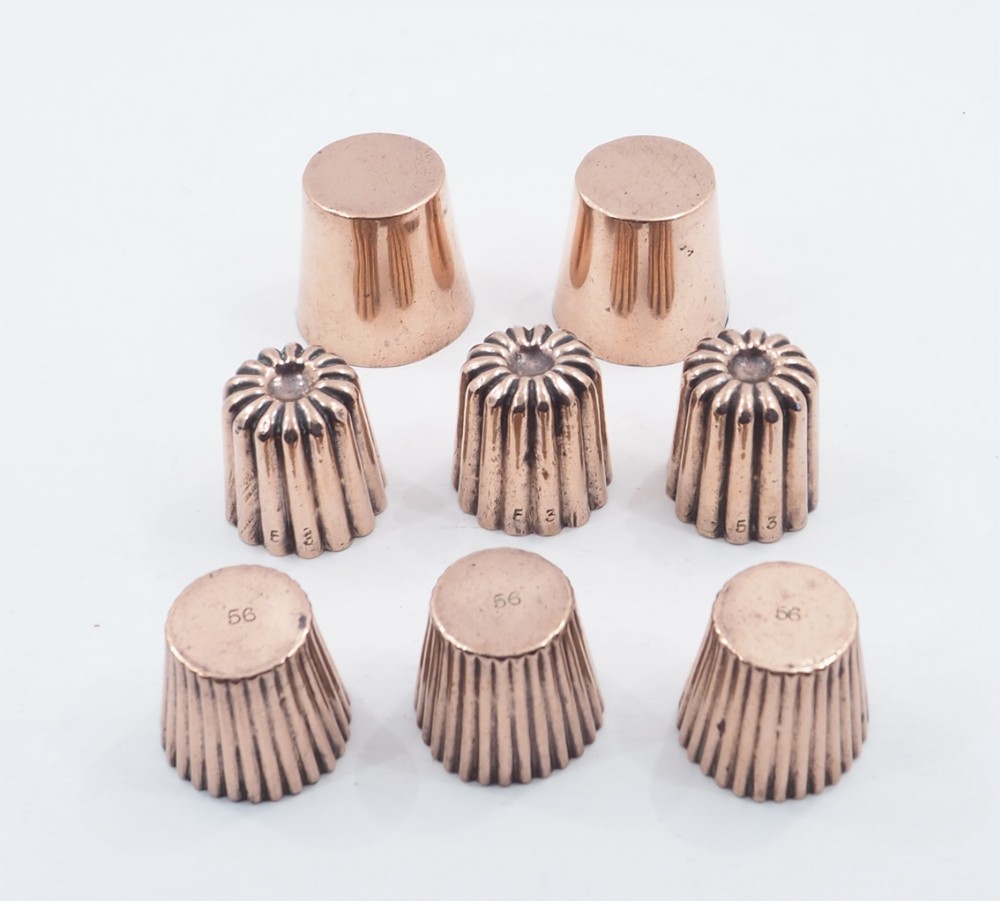 8 SMALL VICTORIAN COPPER JELLY MOULDS