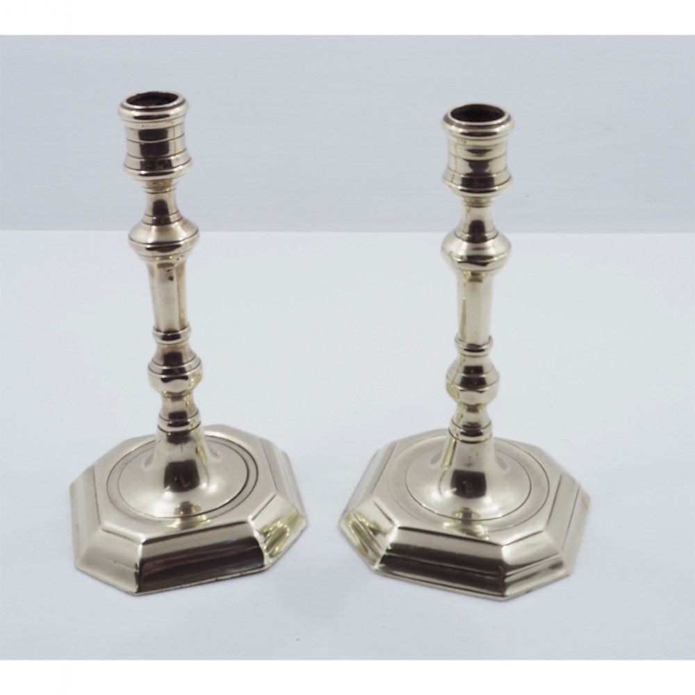 FINE PAIR OF EARLY GEORGIAN CANDLESTICKS