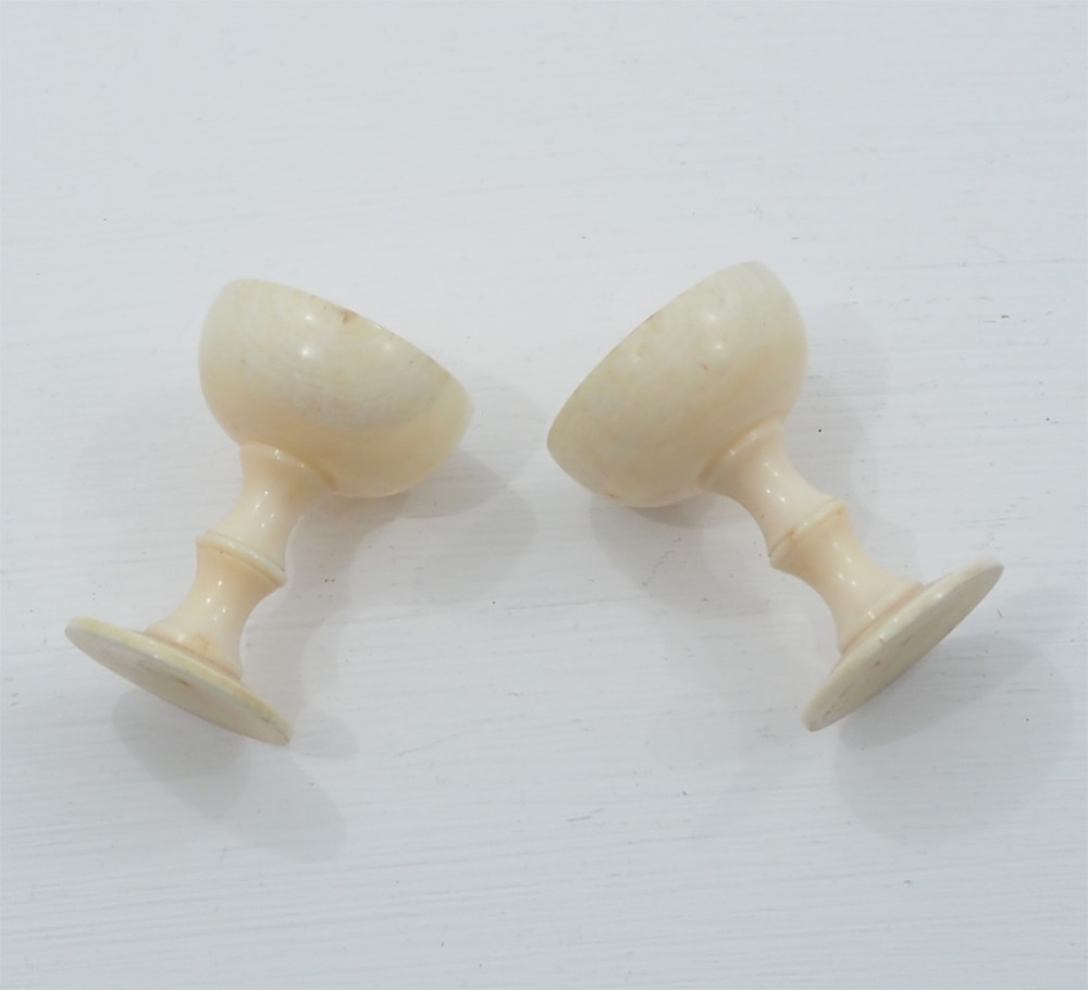UNUSUAL PAIR OF IVORY MINIATURE CUPS
