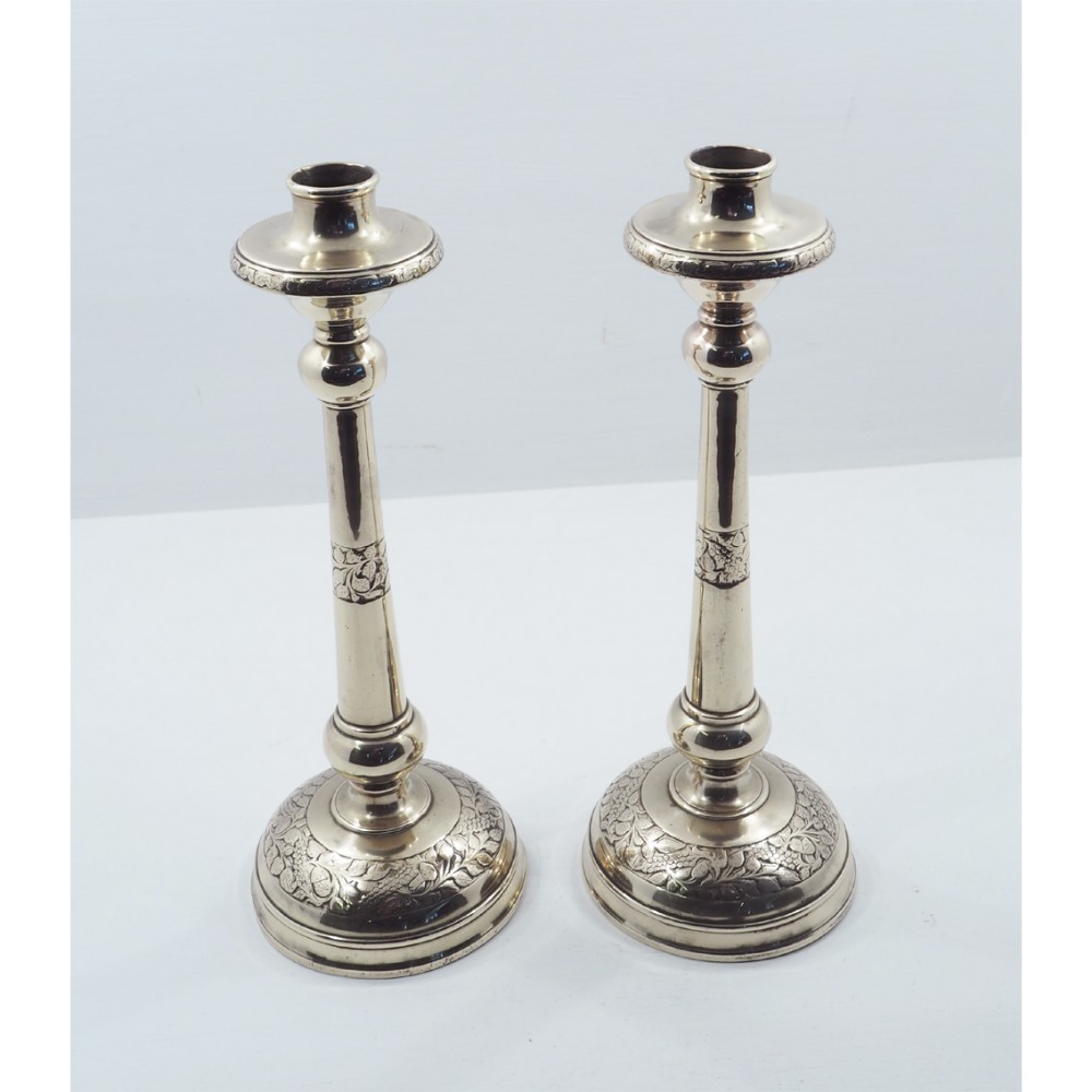 UNUSUAL PAIR OF ARTS & CRAFTS BRASS CANDLESTICKS