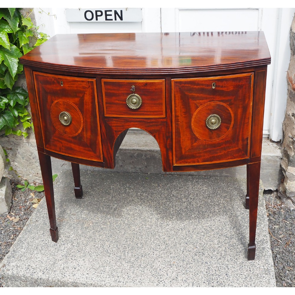 FINE SMALL GEORGE III MAHOGANY BOW SIDEBOARD