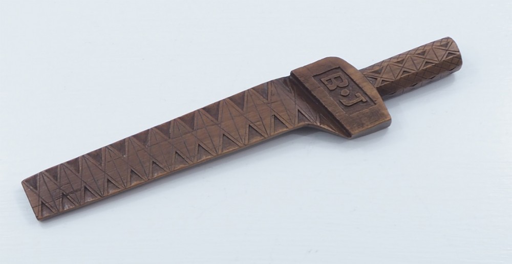 19th CENTURY CARVED LIMEWOOD KNITTING SHEATH