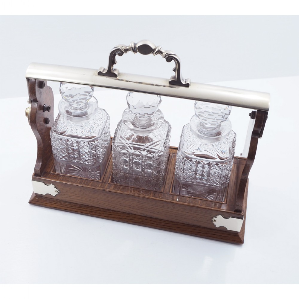 GOOD VICTORIAN OAK 3 DECANTER TANTALUS