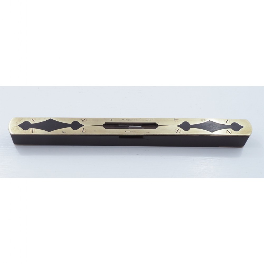HIGHLY DECORATIVE MATHIESON EBONY & BRASS LEVEL