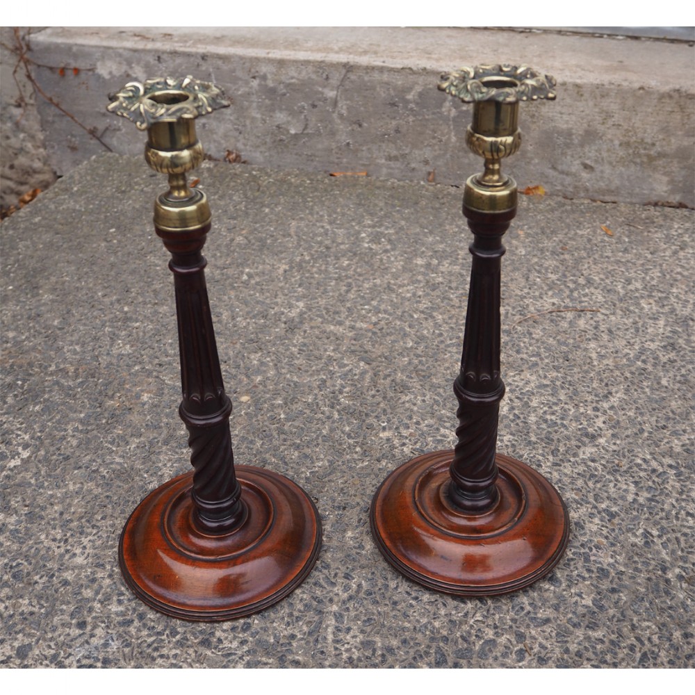 PAIR OF GEORGE III MAHOGANY CANDLESTICKS