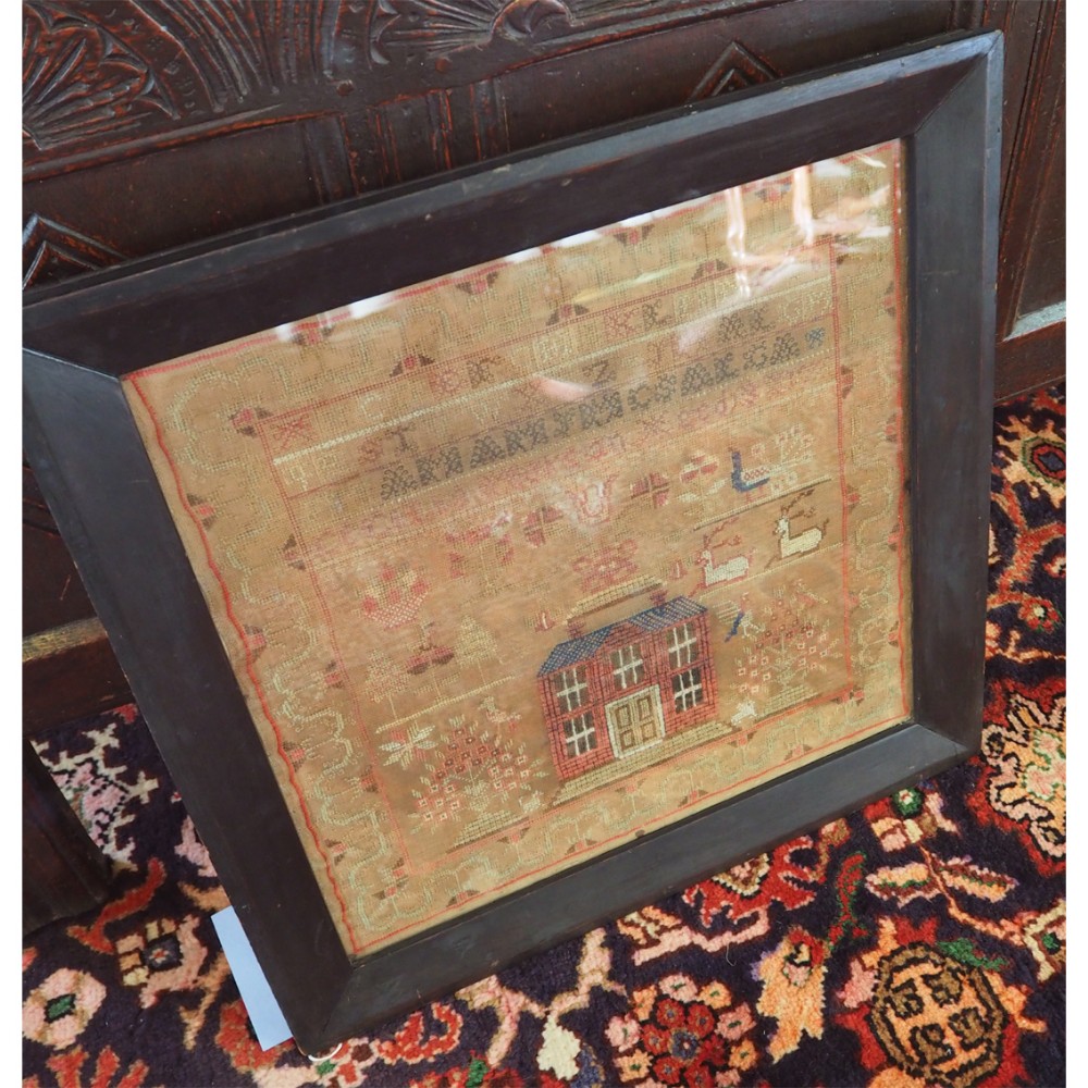 GEORGIAN FRAMED SAMPLER WITH HOUSE.