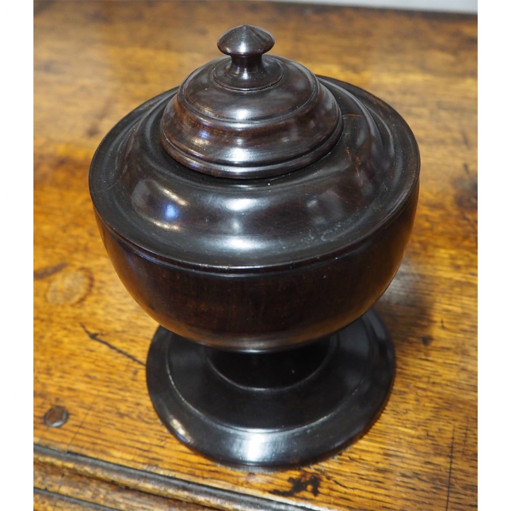 19th CENTURY TURNED EBONY LIDDED URN