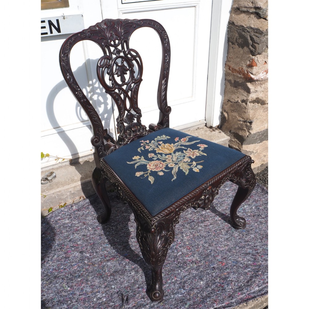 CHIPPENDALE CARVED MAHOGANY LIBRARY CHAIR