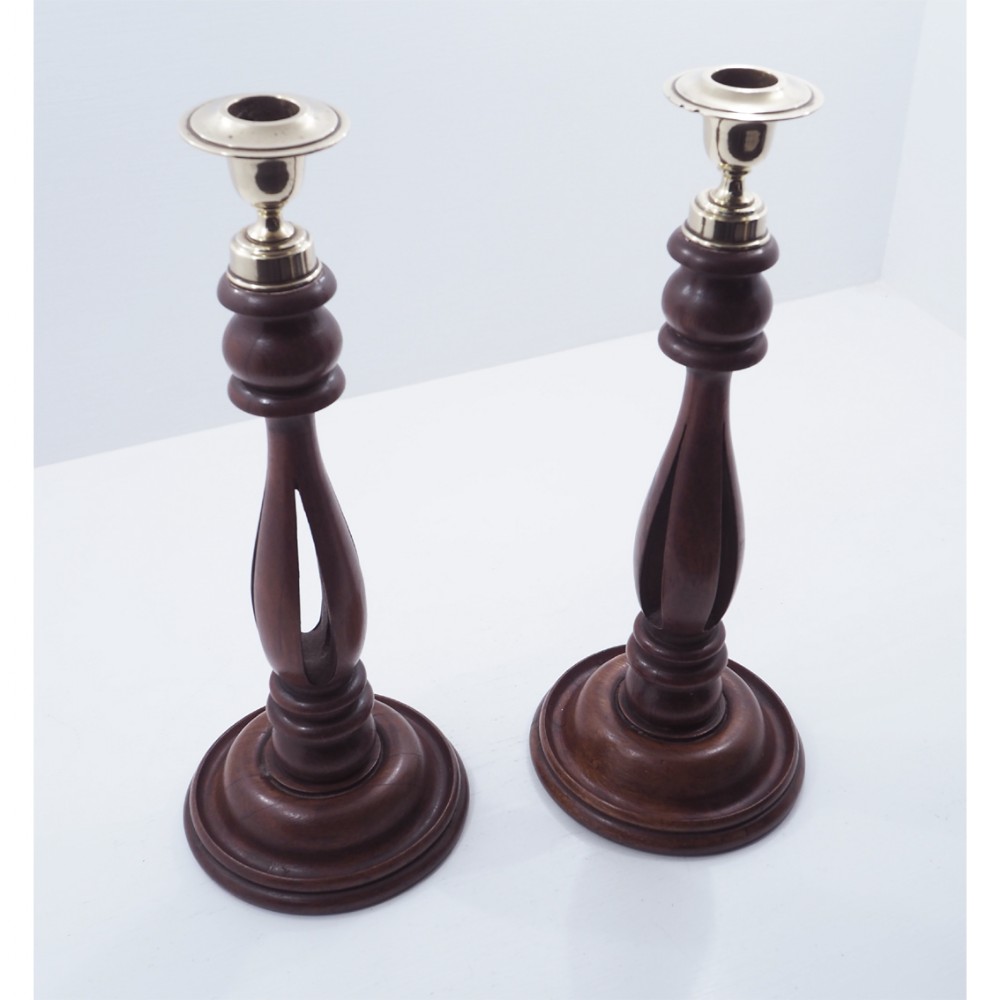 PAIR OF 19TH CENTURY MAHOGANY CANDLESTICKS