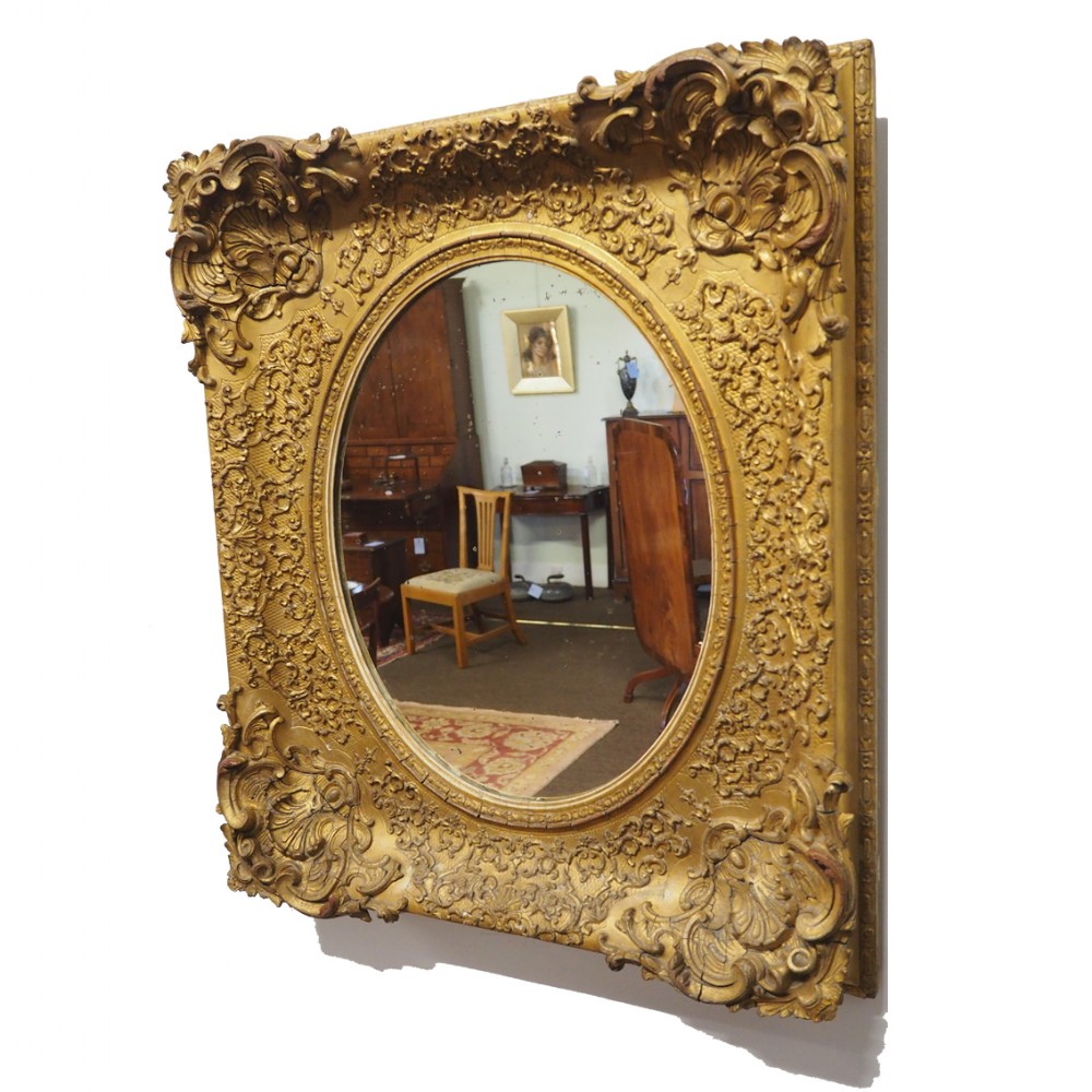 VERY DECORATIVE ANTIQUE GILTWOOD MIRROR