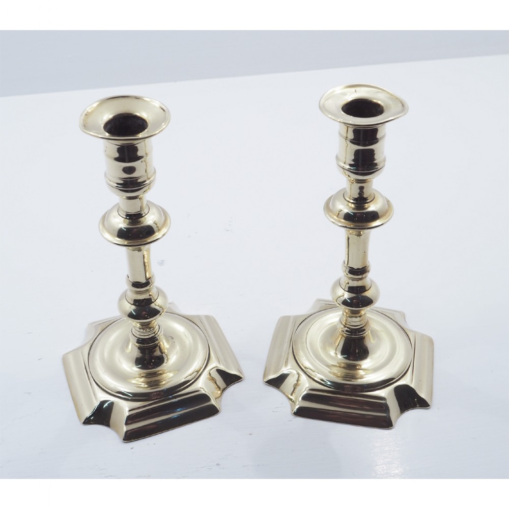 PAIR OF QUEEN ANNE BRASS CANDLESTICKS