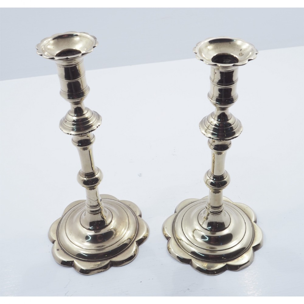 PAIR OF GEORGIAN PETAL BASES CANDLESTICKS