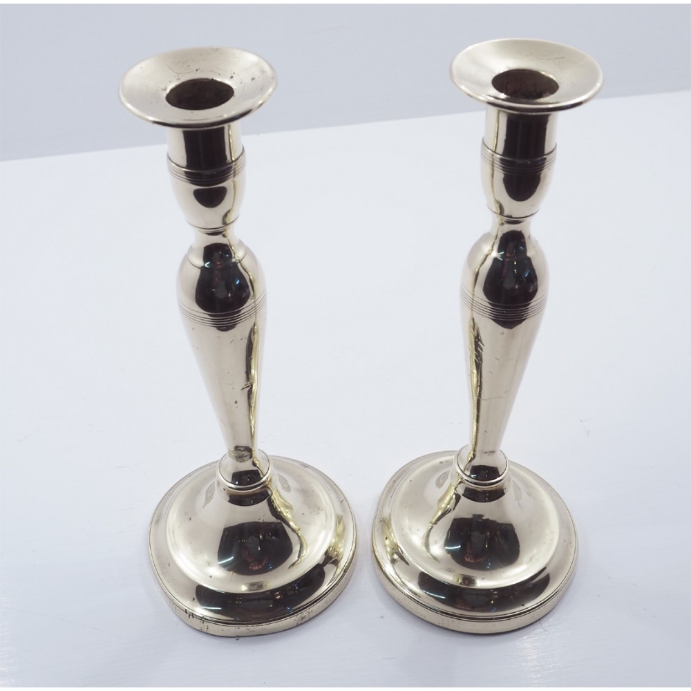 ELEGANT PAIR OF GEORGIAN BRASS CANDLESTICKS