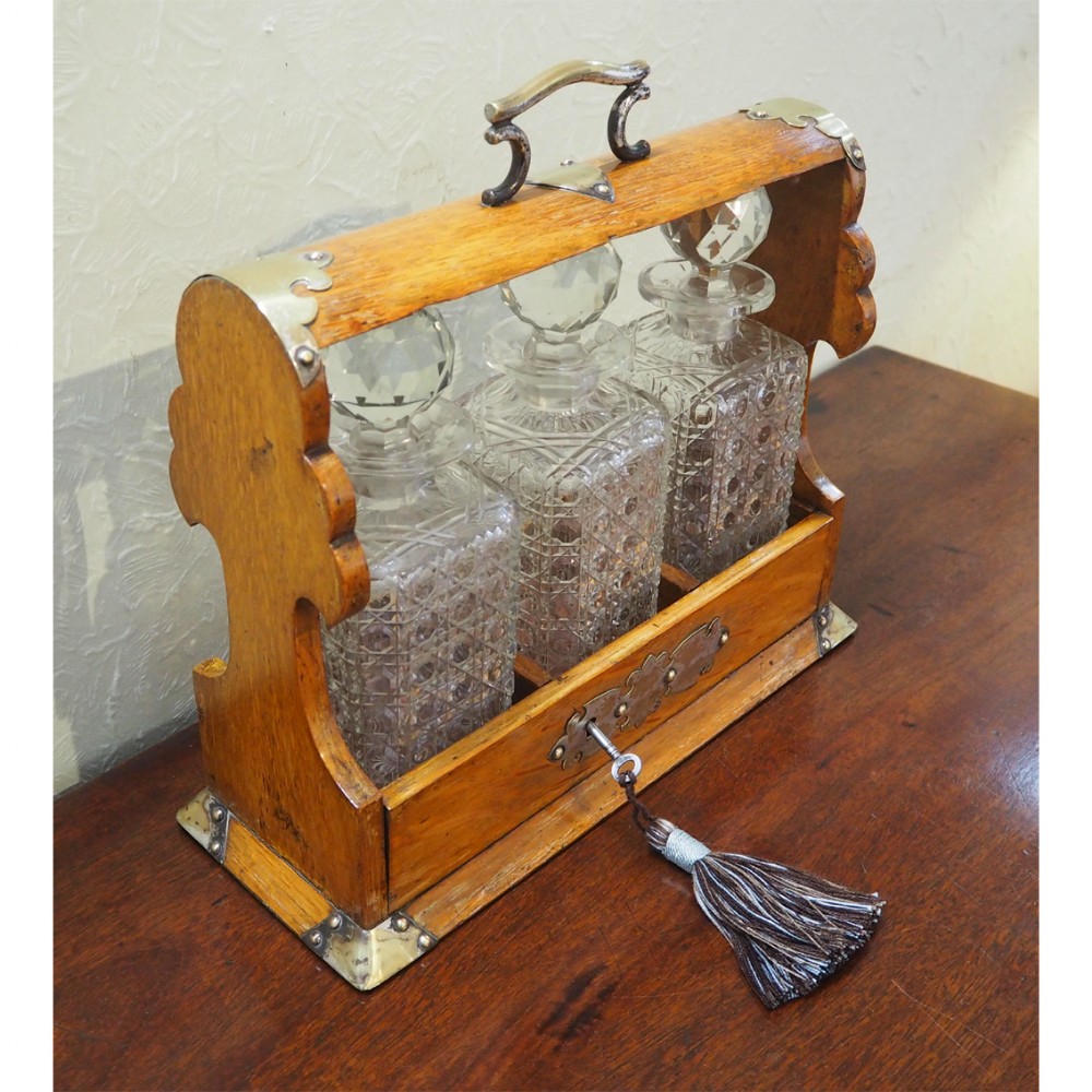 LATE VICTORIAN OAK 3 DECANTER TANTALUS