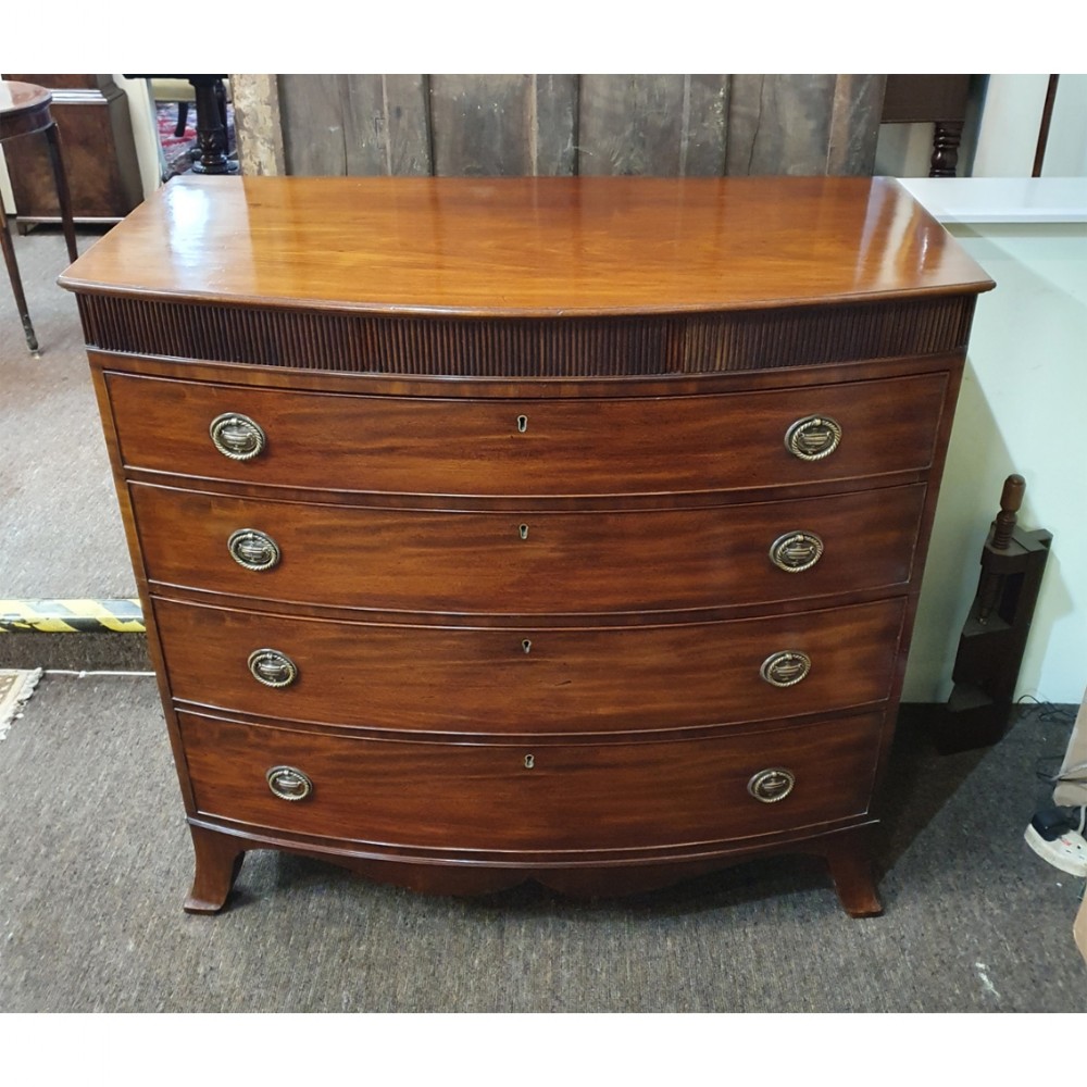 BOW-FRONTED CHEST IN THE MANNER OF GILLOWS