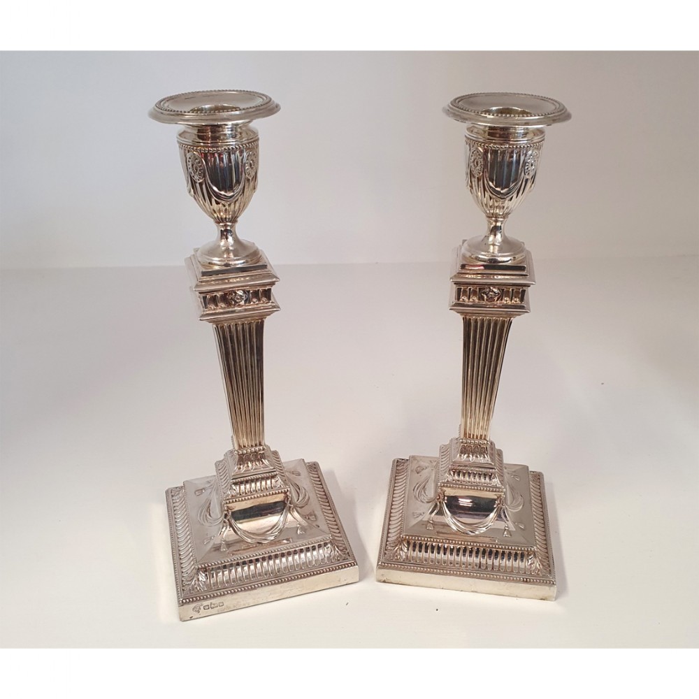 FINE PAIR OF ADAMS STYLE SILVER CANDLESTICKS