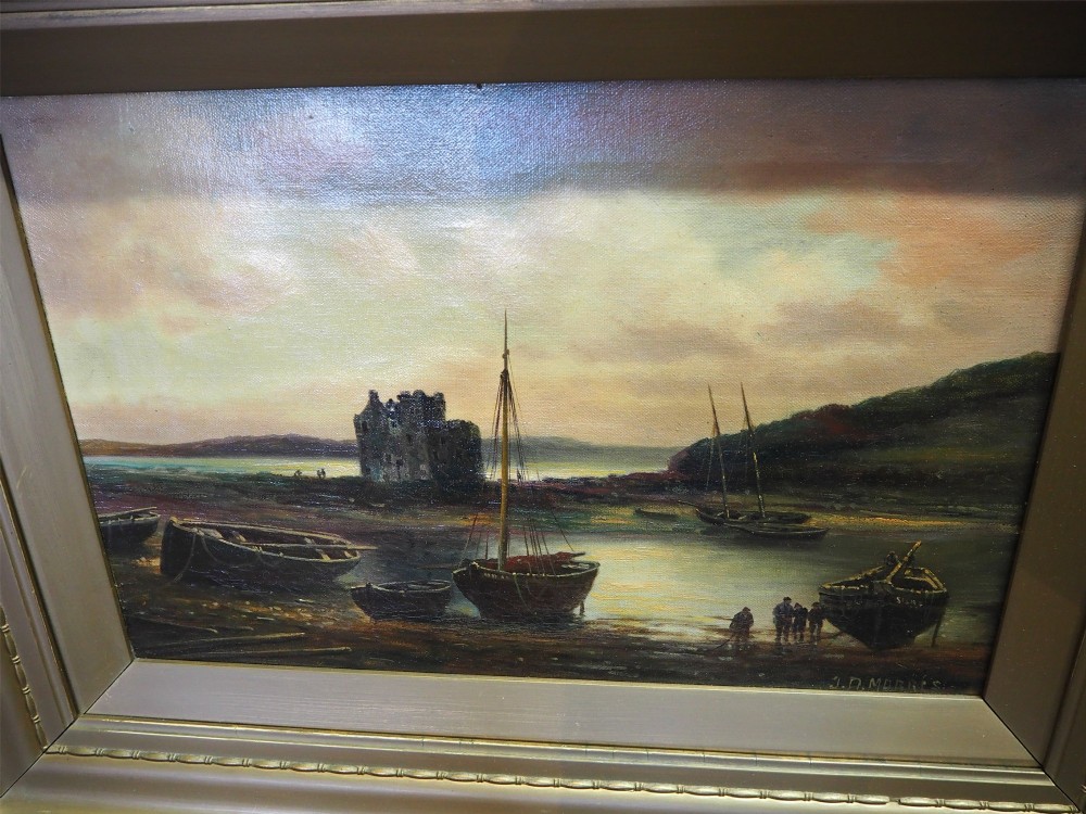 A framed 19th-century Victorian oil painting on canvas depicting a Scottish coastal scene with beached fishing boats, figures, and a castle ruin set within a gilt moulded frame. View II