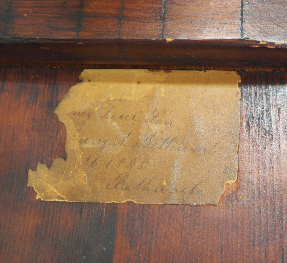 A Georgian burr elm tripod table featuring a circular top, turned pedestal column, and three splayed legs. View VI