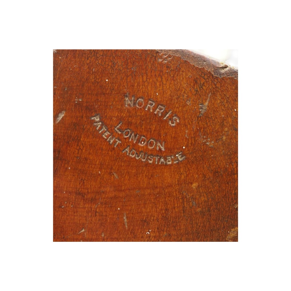 An antique wooden panel plane featuring a beech body, shaped rear handle, steel cutting iron, and brass adjustment mechanism. View VII